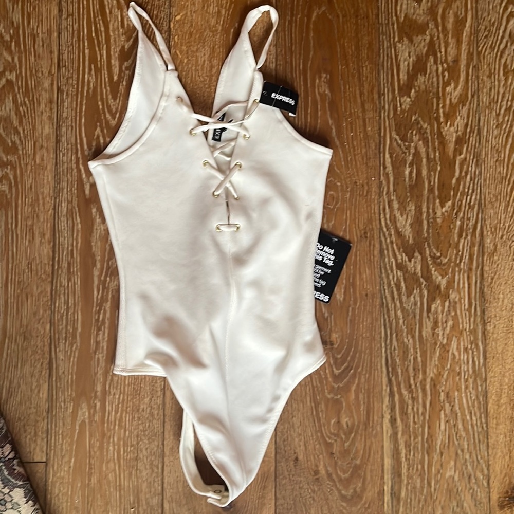 Express bodysuit lace up front white extra small tall petite NWT